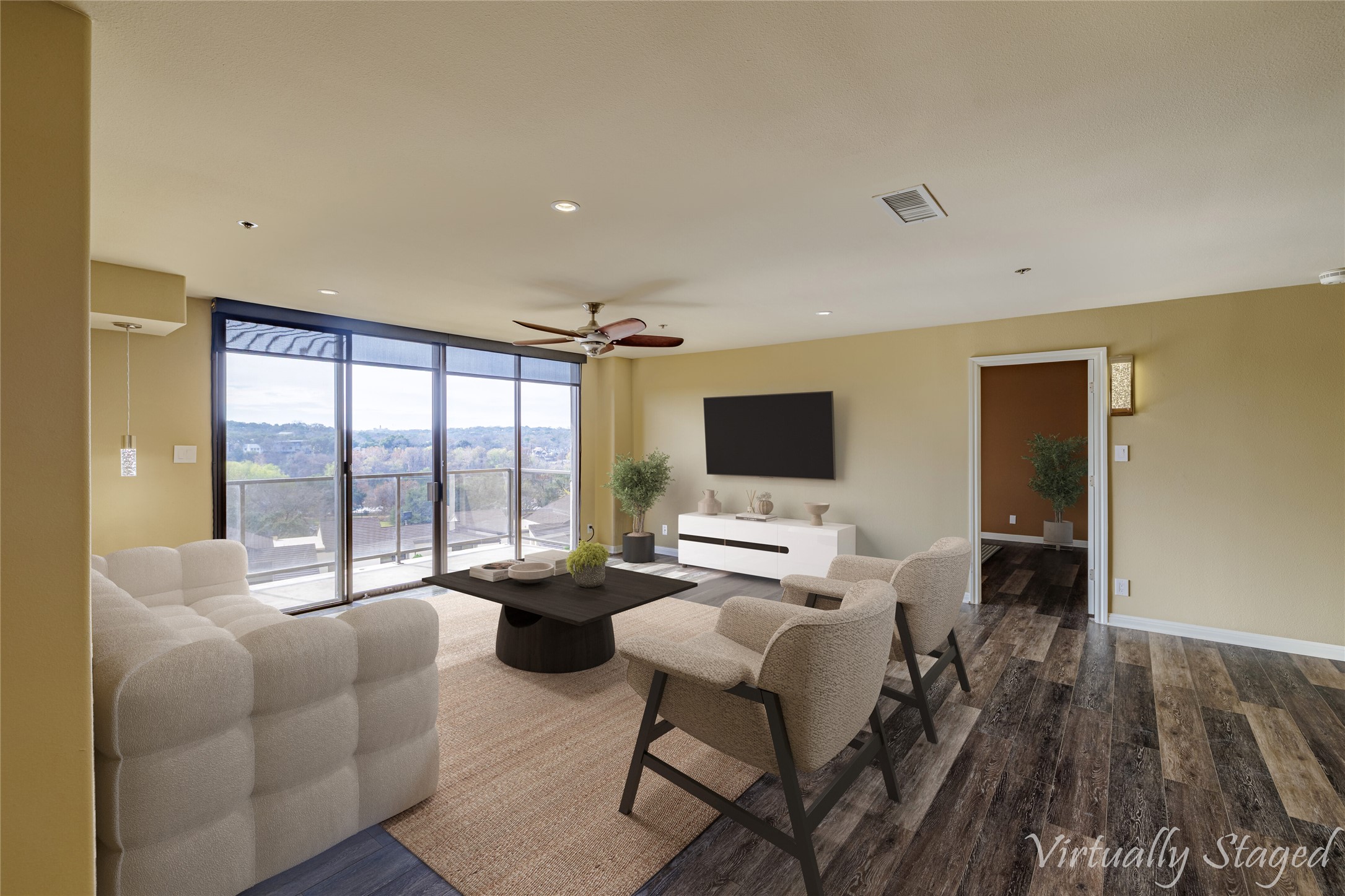 40 North Interstate Highway 35, Unit 6D3 Austin, TX 78701 - Photo 2 of 35 a living room with furniture and a flat screen tv