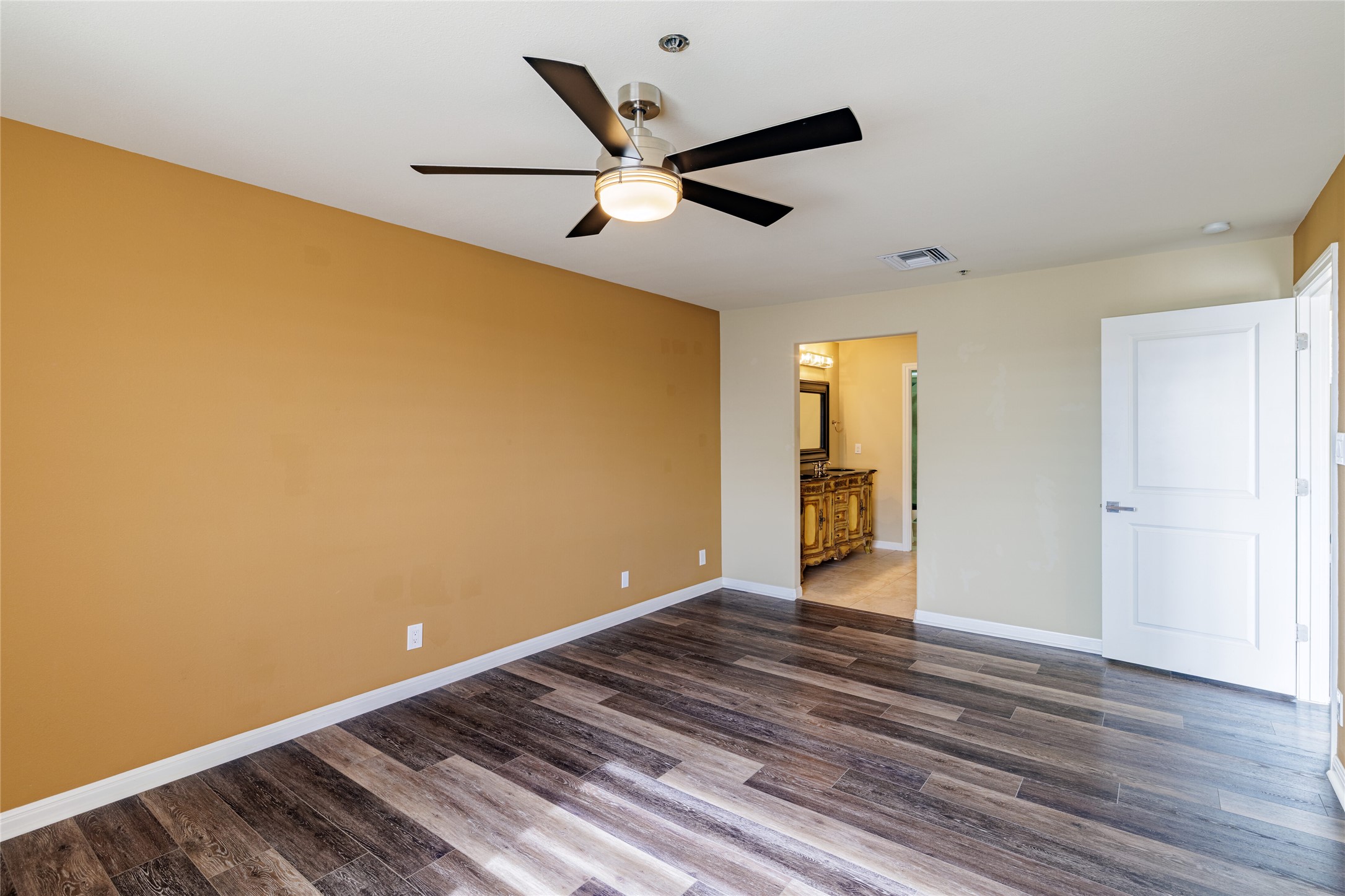 40 North Interstate Highway 35, Unit 6D3 Austin, TX 78701 - Photo 21 of 35 a view of an empty room with wooden floor