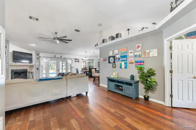 a kitchen with a sink a stove and cabinets