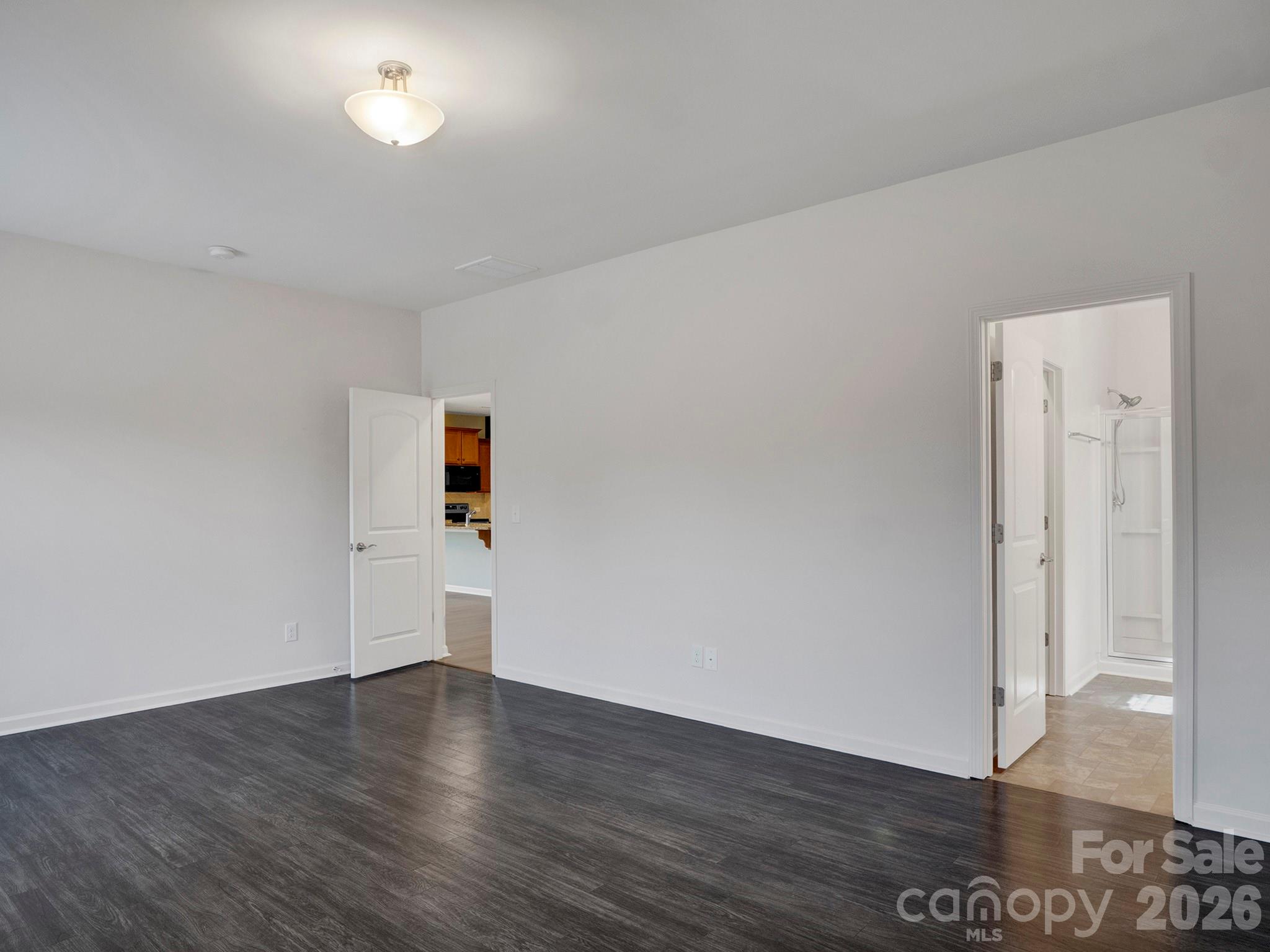 4327 Bent Green Lane Monroe, NC 28112 - Photo 17 of 28 a view of a room with wooden floor