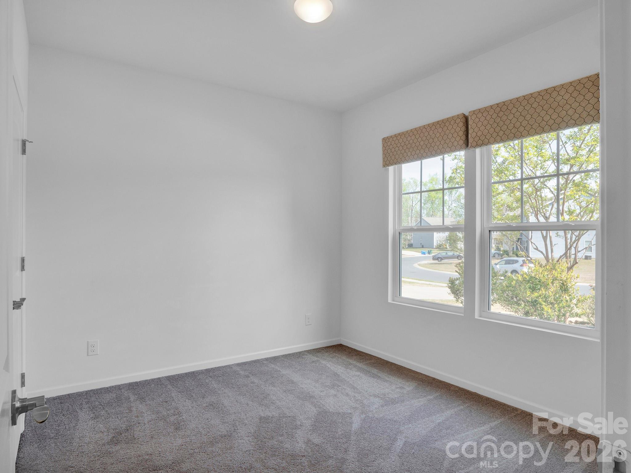 4327 Bent Green Lane Monroe, NC 28112 - Photo 20 of 28 an empty room with a window