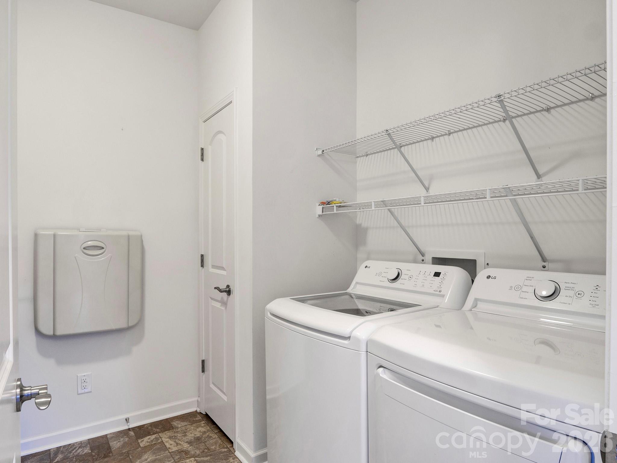 4327 Bent Green Lane Monroe, NC 28112 - Photo 23 of 28 a utility room with dryer and washer
