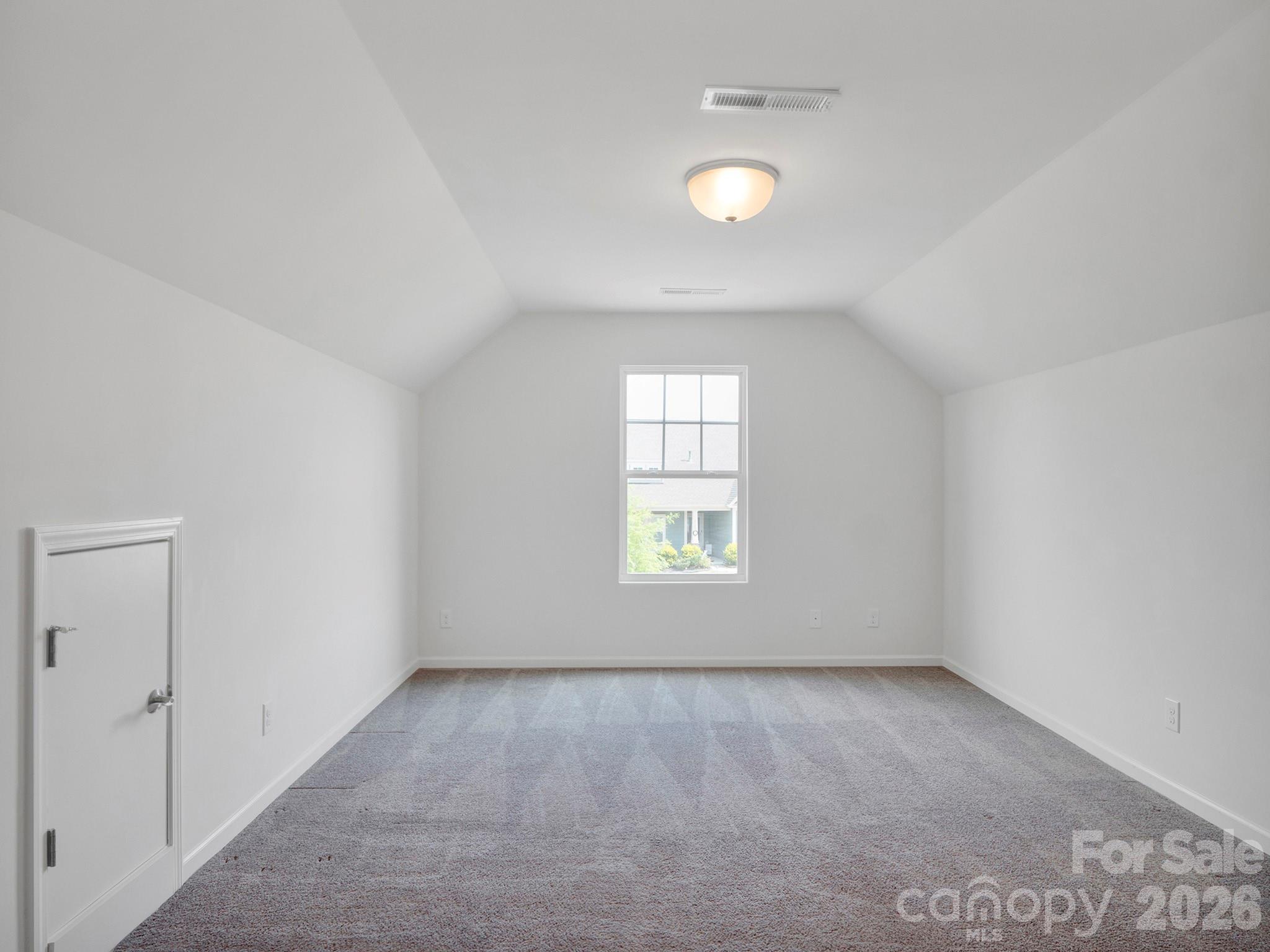 4327 Bent Green Lane Monroe, NC 28112 - Photo 26 of 28 an empty room with windows