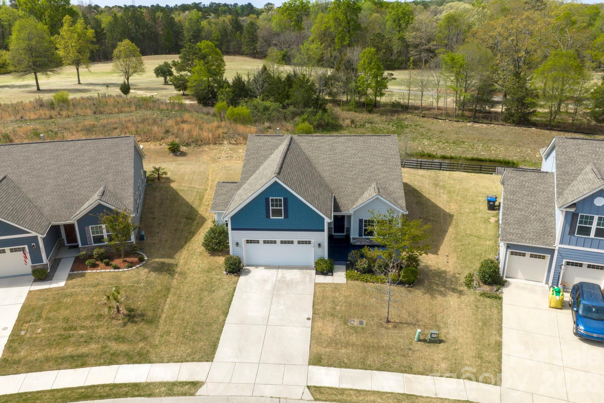 4327 Bent Green Lane Monroe, NC 28112 - Photo 28 of 28 a view of a house with a yard