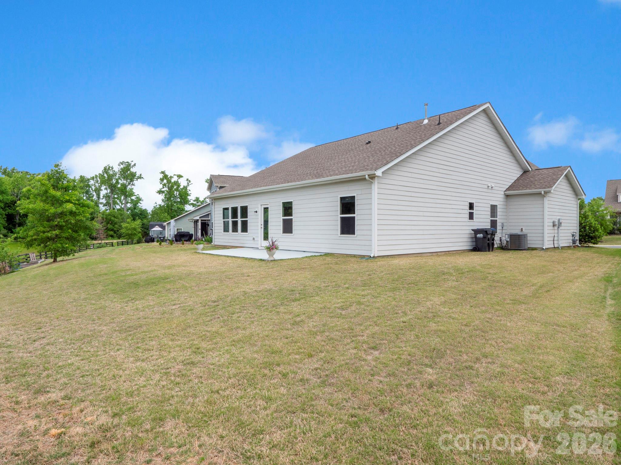 4327 Bent Green Lane Monroe, NC 28112 - Photo 6 of 28 a house view with a garden space