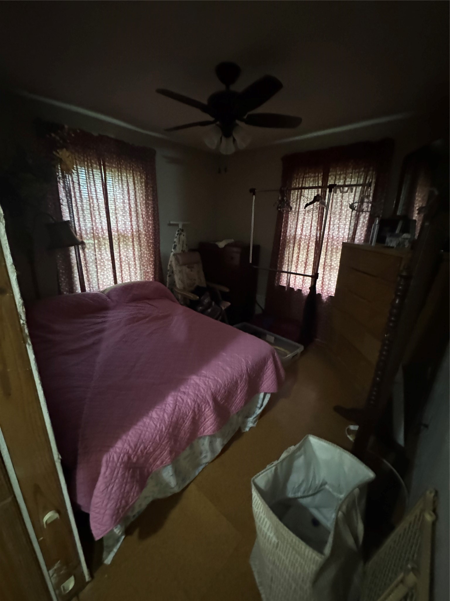 45 County Road 2859 Cleveland, TX 77327 - Photo 13 of 15 a bed sitting in a bedroom next to a window