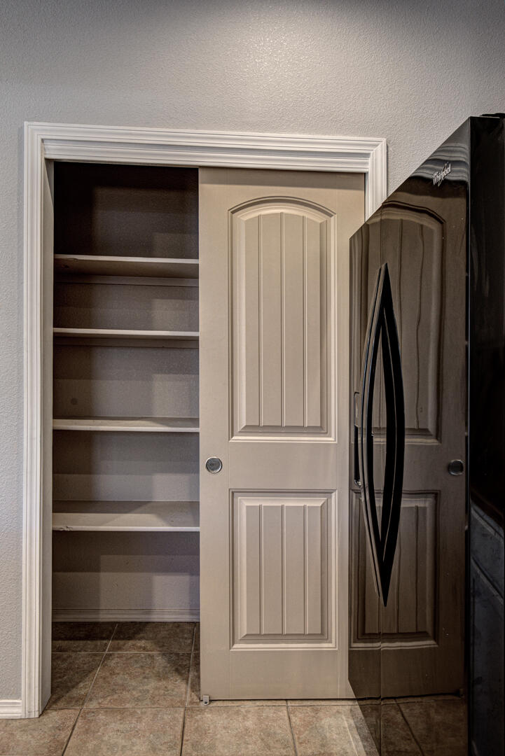 334 East Cedar Mill Road Star Valley, AZ 85541 - Photo 11 of 32 a view of walk in closet with empty racks