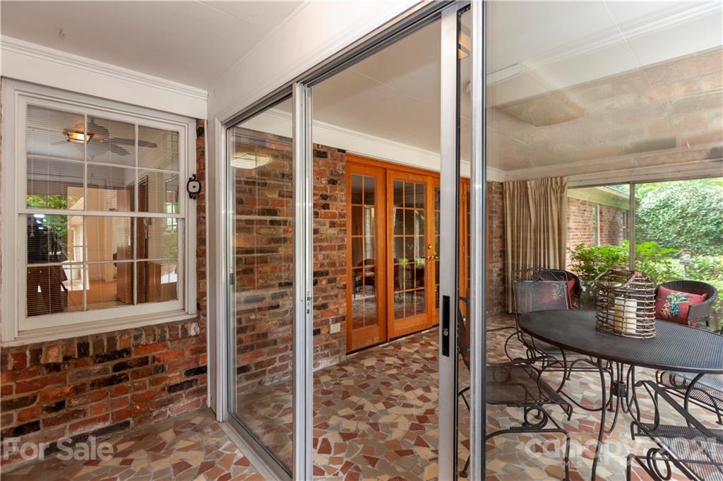 3336 Ferncliff Road Charlotte, NC 28211 - Photo 22 of 30 a view of a dining room with furniture window and outside view
