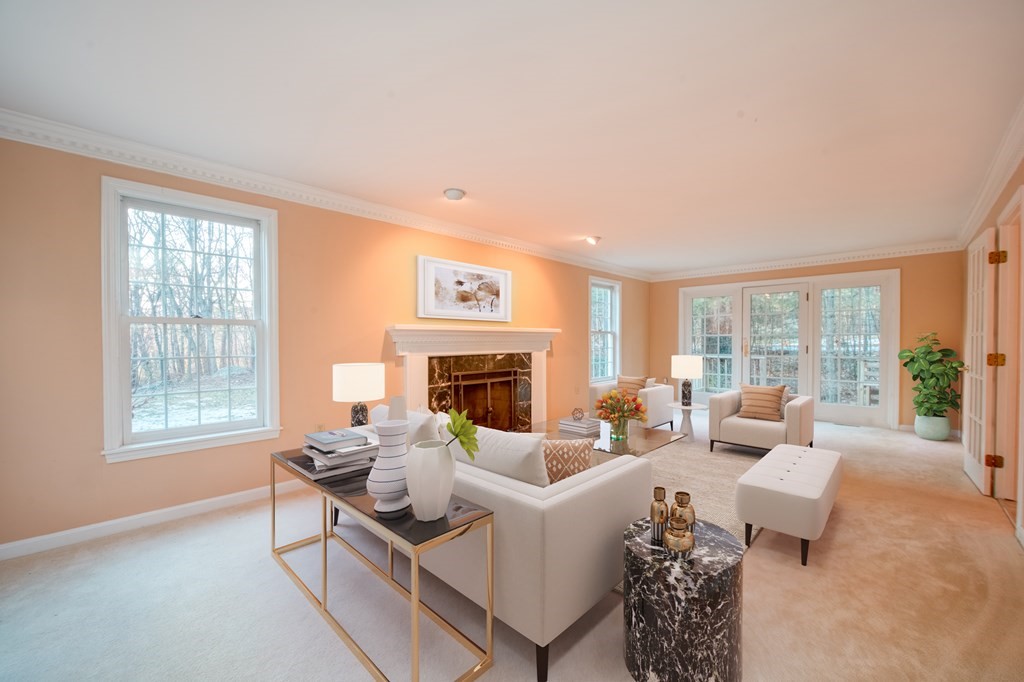 873 Depot Road Boxborough, MA 01719 - Photo 13 of 33 a living room with furniture and a fireplace