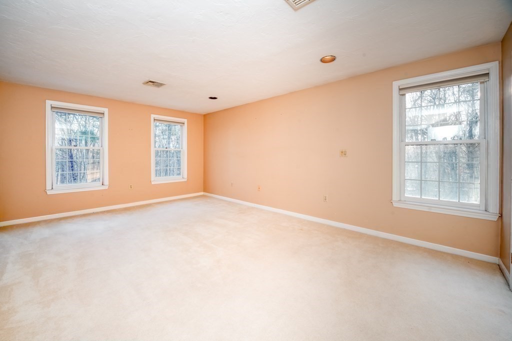 873 Depot Road Boxborough, MA 01719 - Photo 17 of 33 a view of an empty room with a window