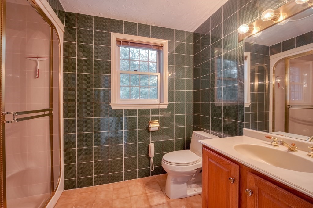 873 Depot Road Boxborough, MA 01719 - Photo 18 of 33 a bathroom with a sink toilet and shower