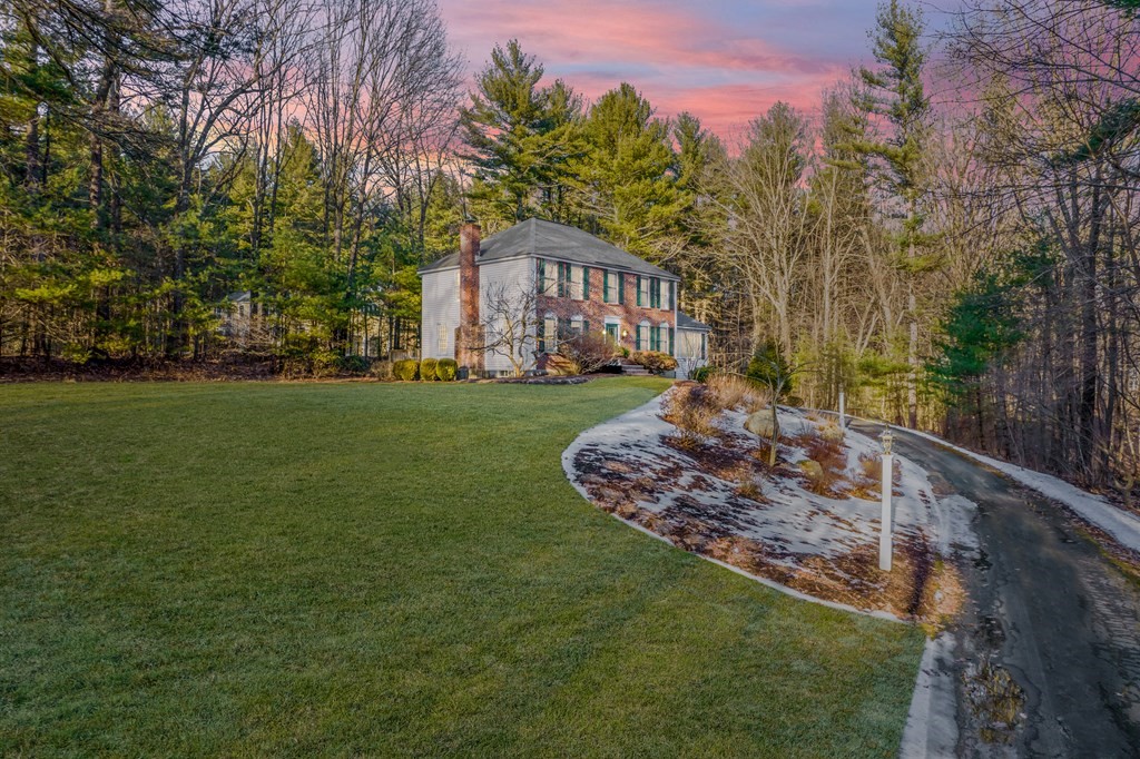 873 Depot Road Boxborough, MA 01719 - Photo 2 of 33 a view of a house with a yard