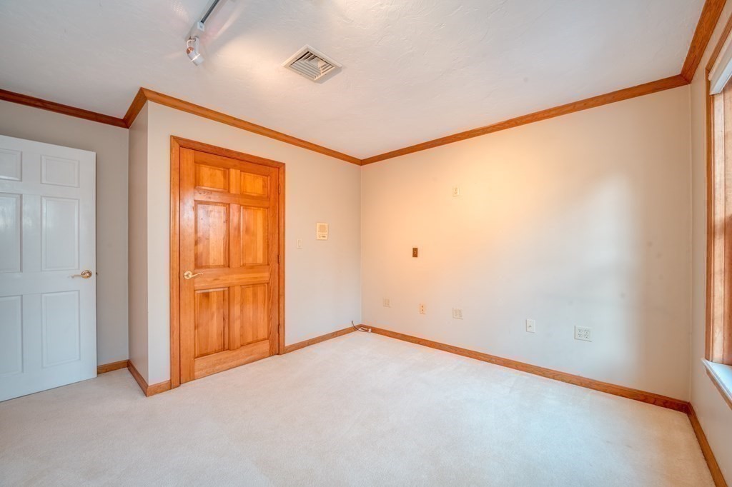873 Depot Road Boxborough, MA 01719 - Photo 22 of 33 an empty room with closet