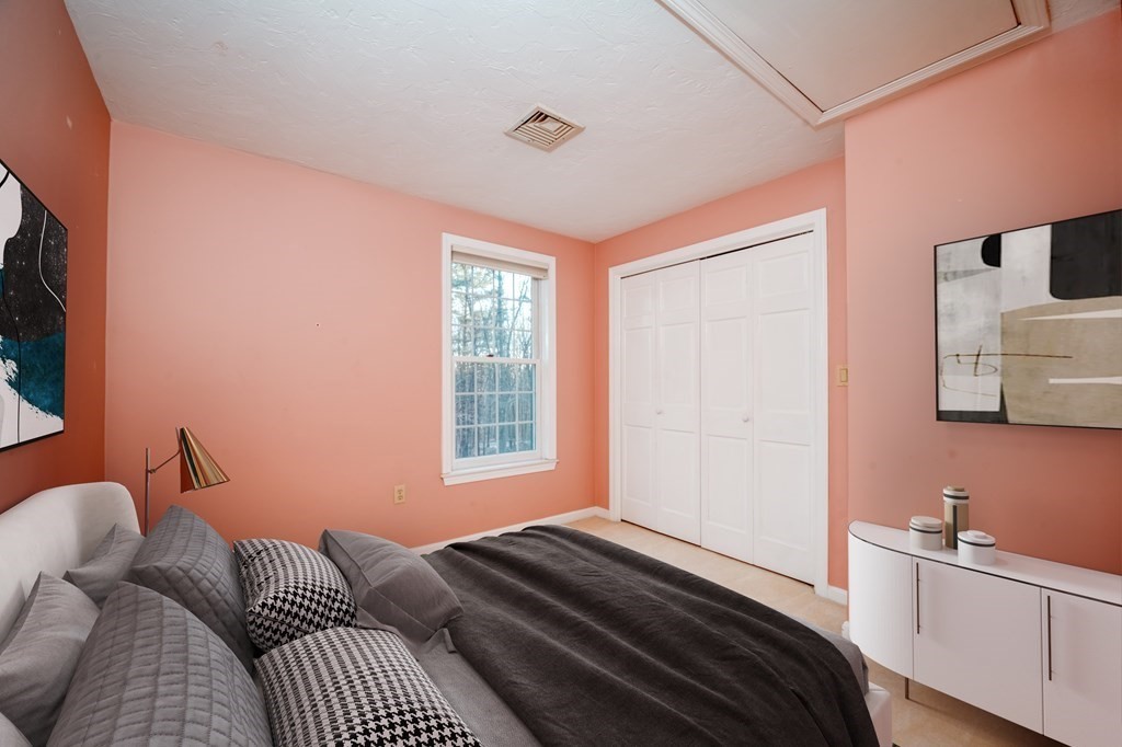 873 Depot Road Boxborough, MA 01719 - Photo 23 of 33 a bedroom with furniture and a window
