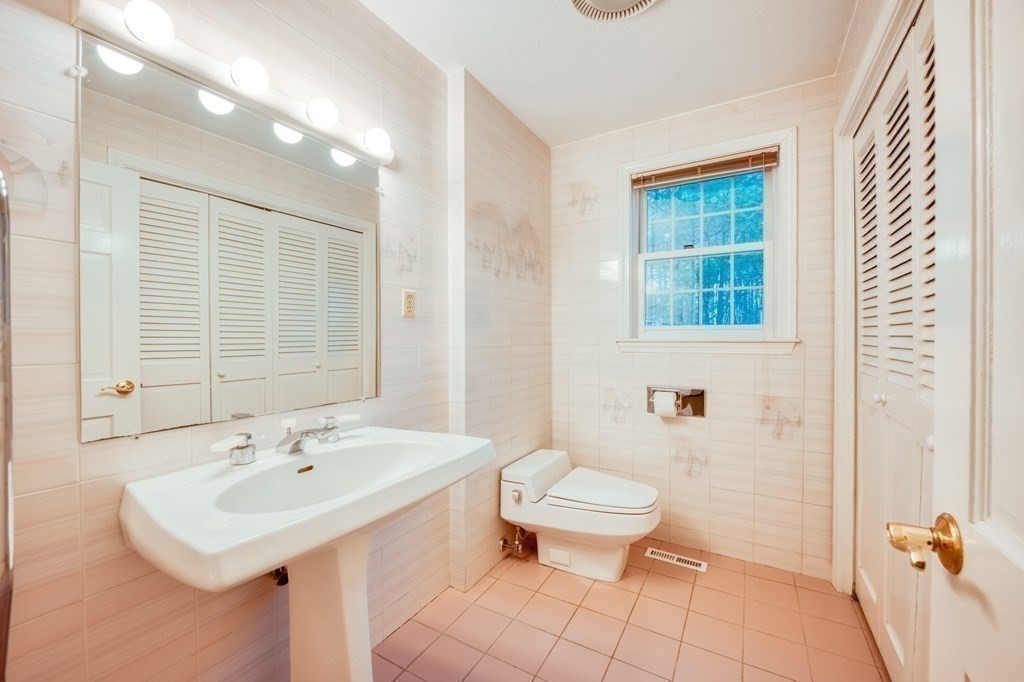 873 Depot Road Boxborough, MA 01719 - Photo 26 of 33 a bathroom with a sink toilet and shower