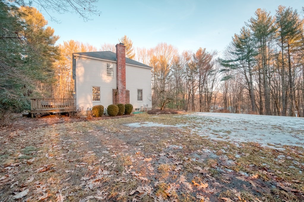 873 Depot Road Boxborough, MA 01719 - Photo 31 of 33 a backyard of a house with lots of green space