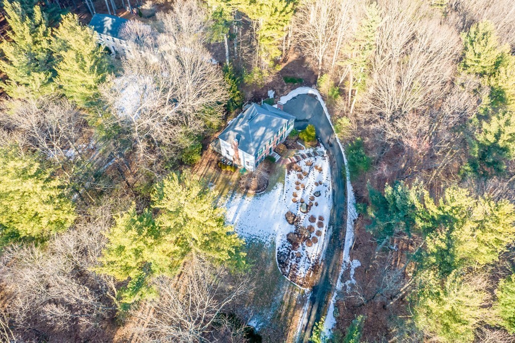 873 Depot Road Boxborough, MA 01719 - Photo 4 of 33 a view of a tree in a yard