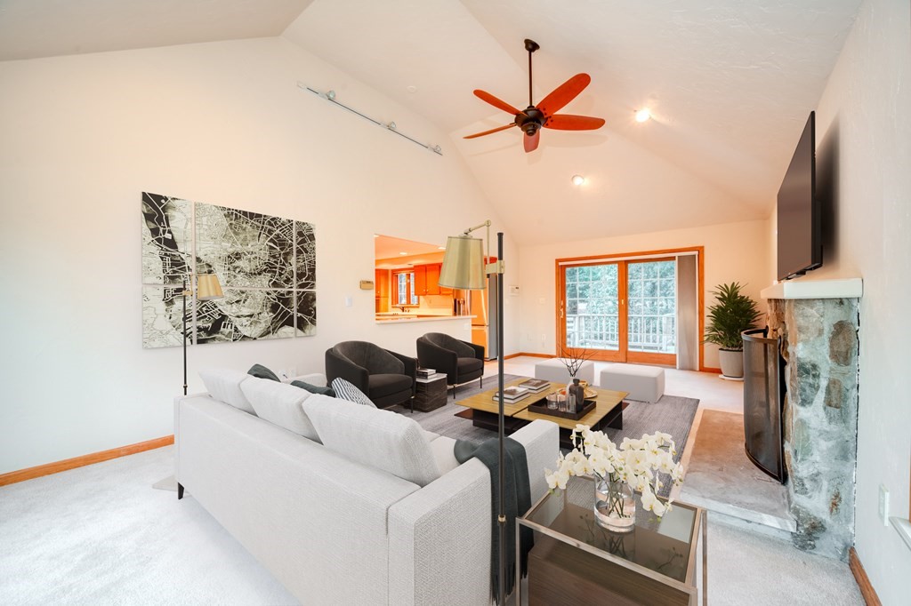 873 Depot Road Boxborough, MA 01719 - Photo 8 of 33 a living room with furniture fireplace and flat screen tv