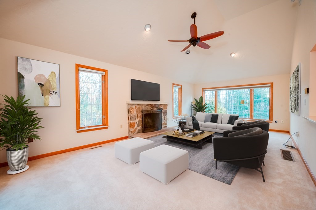 873 Depot Road Boxborough, MA 01719 - Photo 9 of 33 a living room with furniture fireplace and a window