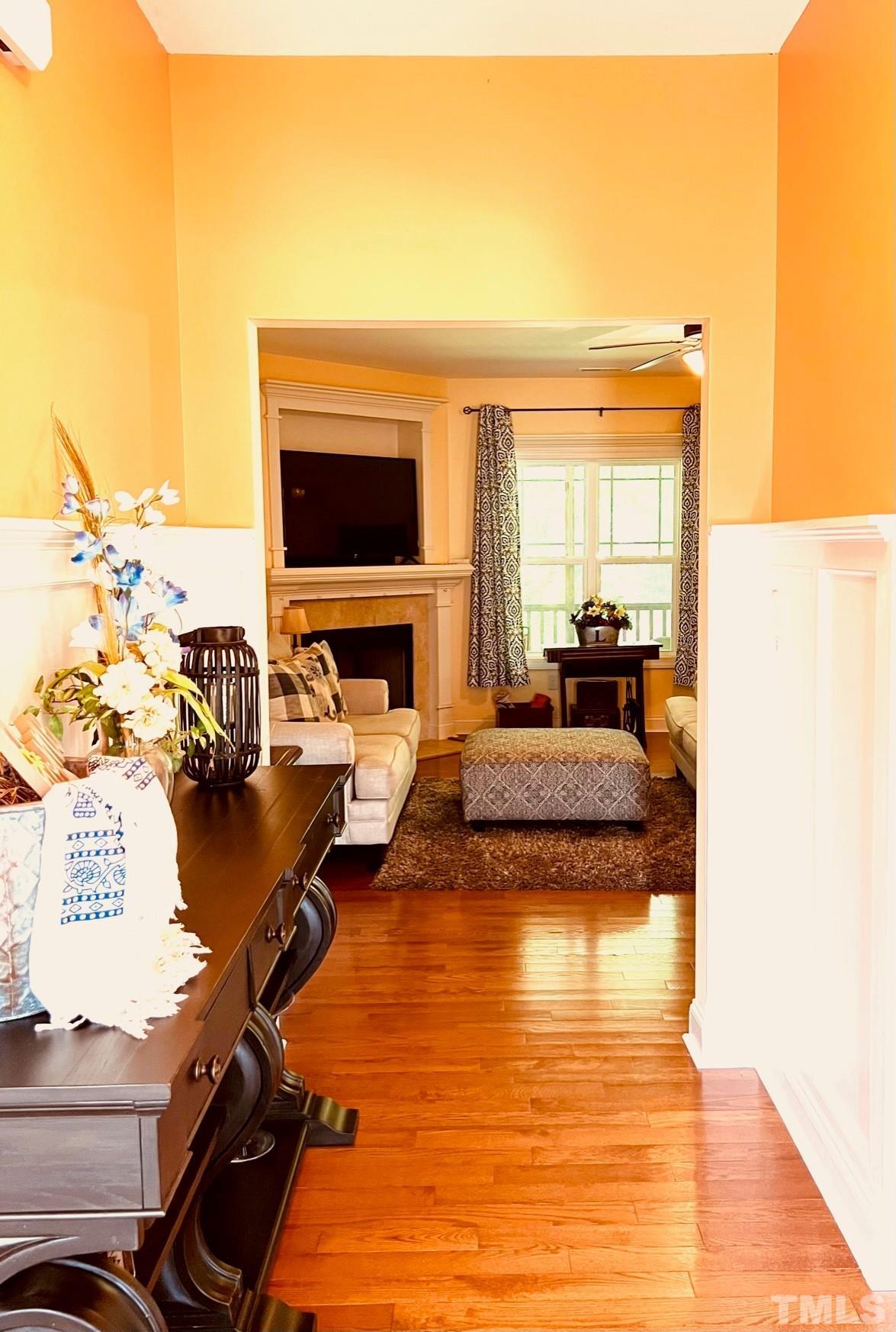 70 Breadnut Drive Smithfield, NC 27577 - Photo 11 of 19 a living room with furniture and a flat screen tv