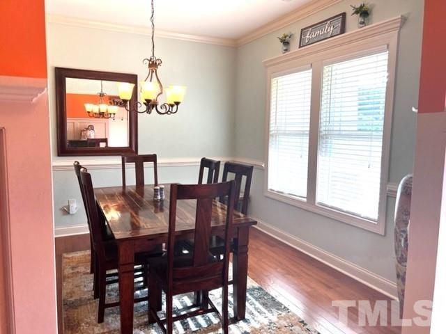 70 Breadnut Drive Smithfield, NC 27577 - Photo 16 of 19 a view of a dining room with furniture window and outside view