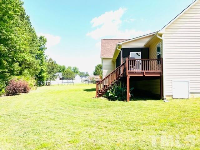 70 Breadnut Drive Smithfield, NC 27577 - Photo 7 of 19 a view of swimming pool with an outdoor space and seating area
