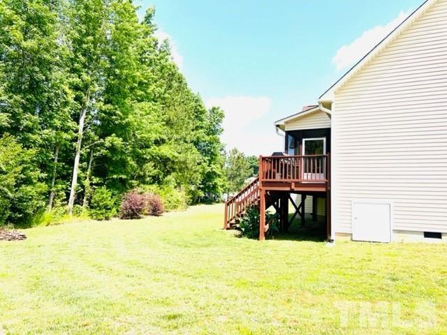 70 Breadnut Drive Smithfield, NC 27577 - Photo 8 of 19 a view of a house with a yard