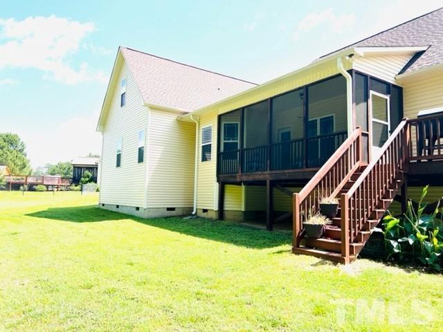 70 Breadnut Drive Smithfield, NC 27577 - Photo 9 of 19 a view of an house with backyard and a tree
