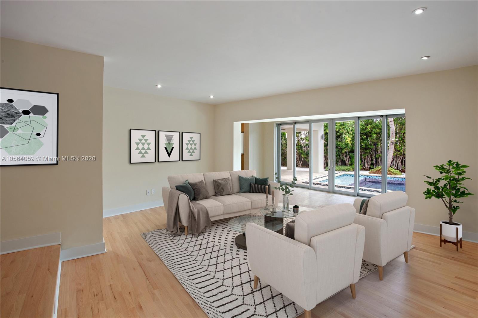 335 Pacific Road Key Biscayne, FL 33149 - Photo 14 of 50 a living room with furniture and a large window