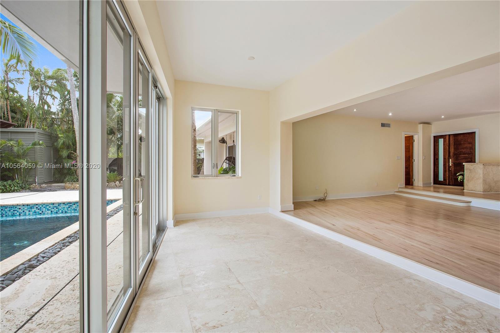 335 Pacific Road Key Biscayne, FL 33149 - Photo 16 of 50 a view of an empty room and bathroom