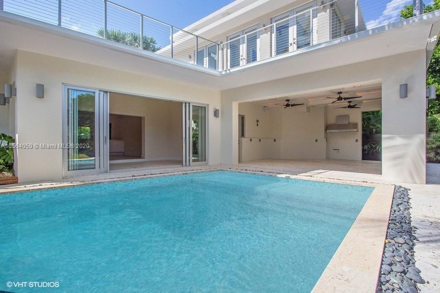 335 Pacific Road Key Biscayne, FL 33149 - Photo 36 of 50 a view of an entrance of the house