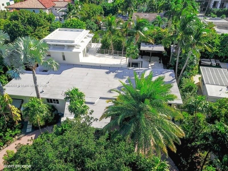 335 Pacific Road Key Biscayne, FL 33149 - Photo 47 of 50 a view of a swimming pool with a patio
