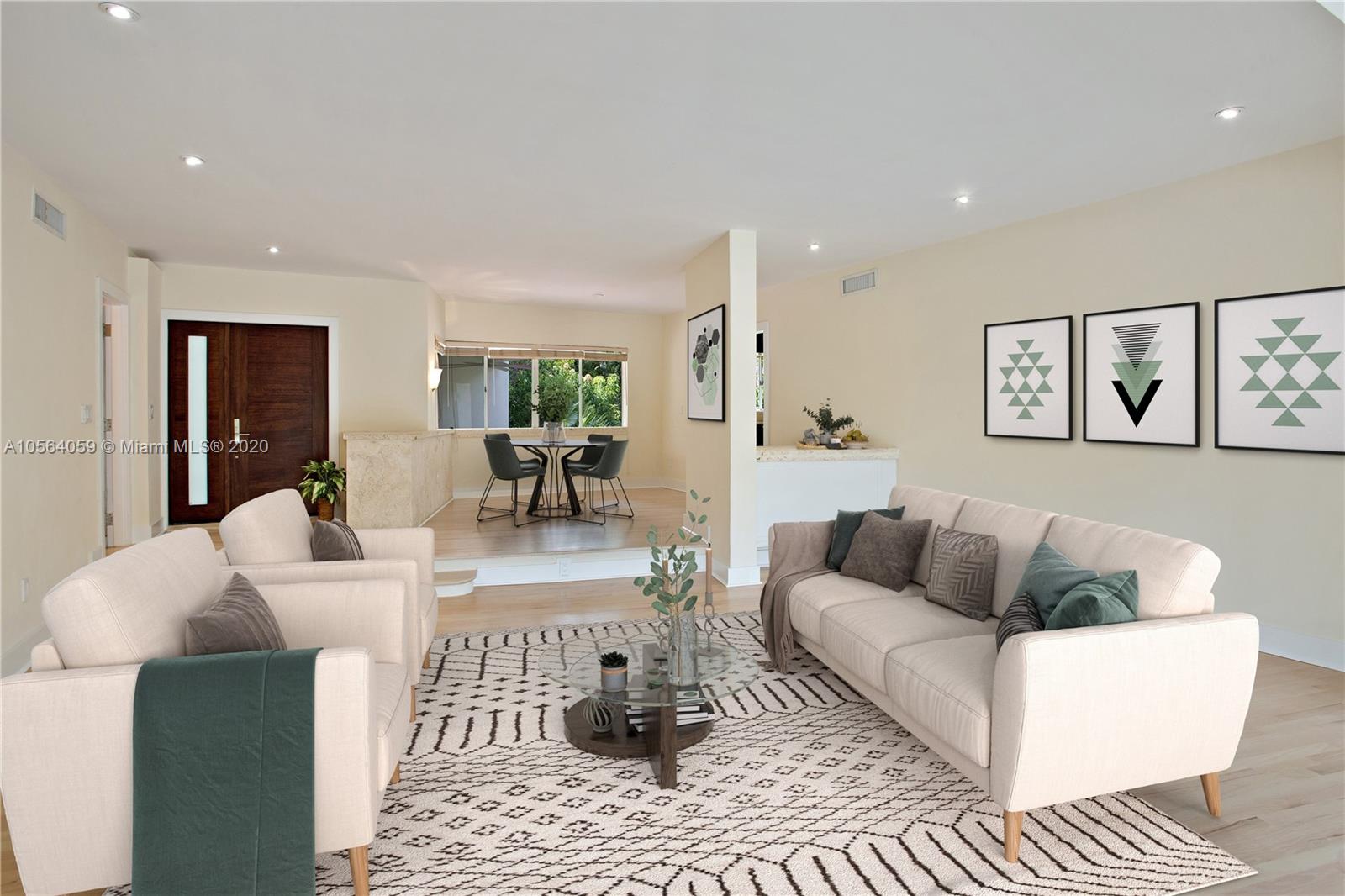 335 Pacific Road Key Biscayne, FL 33149 - Photo 9 of 50 a living room with furniture and a rug