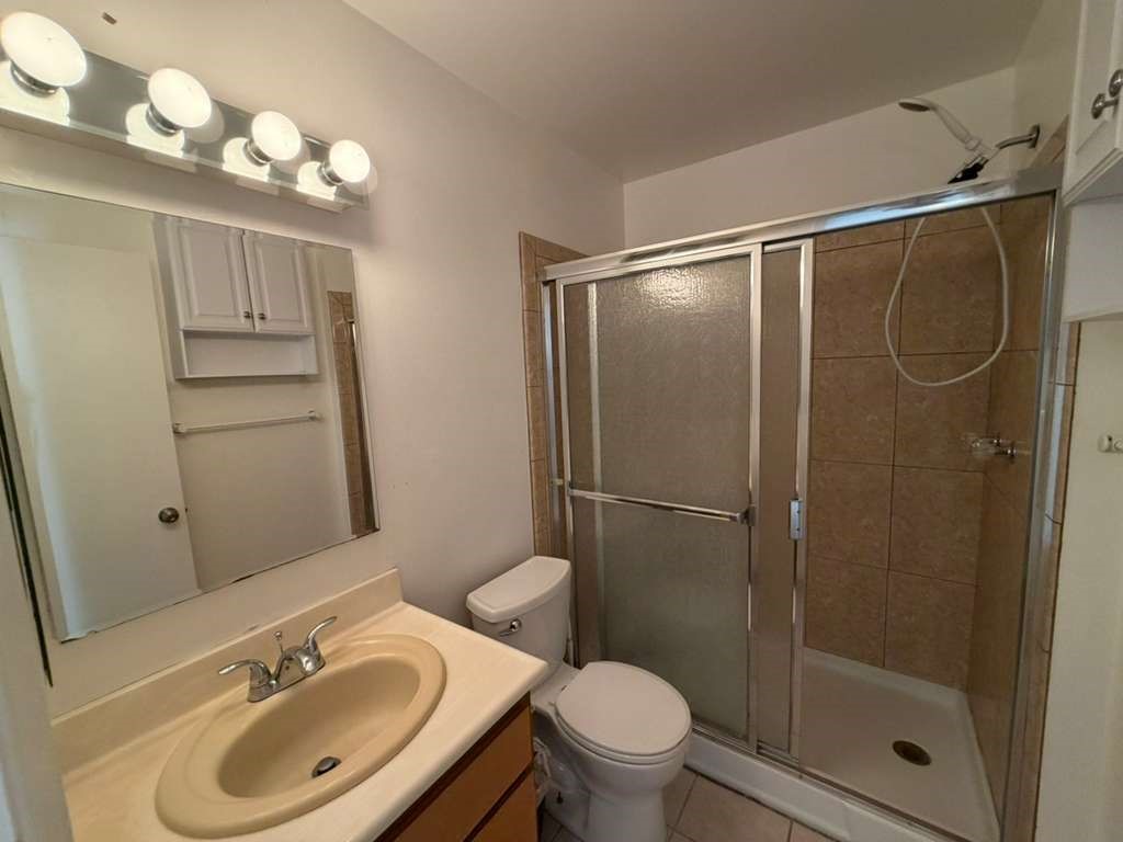 330 North Chapel Avenue, Unit 212 Alhambra, CA 91801 - Photo 16 of 25 a bathroom with a sink toilet and shower