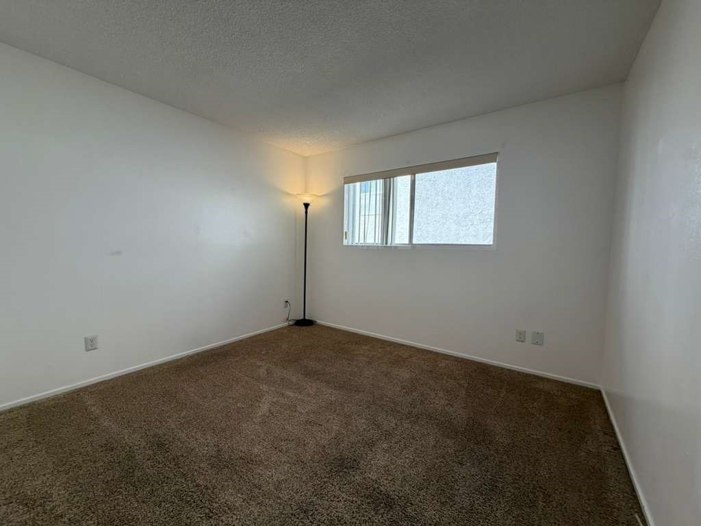 330 North Chapel Avenue, Unit 212 Alhambra, CA 91801 - Photo 18 of 25 an empty room with a window