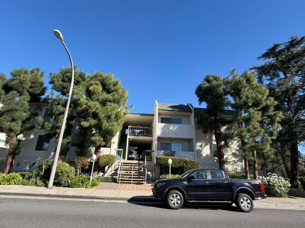 330 North Chapel Avenue, Unit 212 Alhambra, CA 91801 - Photo 2 of 25 a car parked on the side of a street