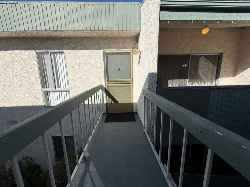 330 North Chapel Avenue, Unit 212 Alhambra, CA 91801 - Photo 7 of 25 a view of staircase with wooden floor and a window