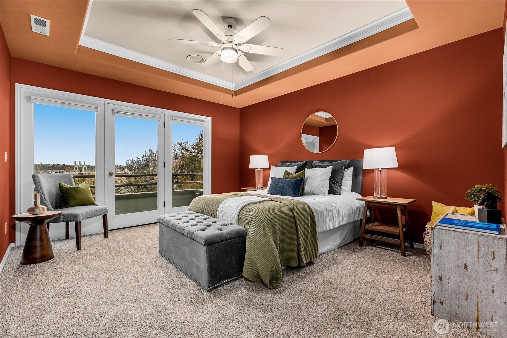 2349 Harbor Avenue Southwest, Unit 303 Seattle, WA 98126 - Photo 16 of 36 a bedroom with a bed and a chandelier