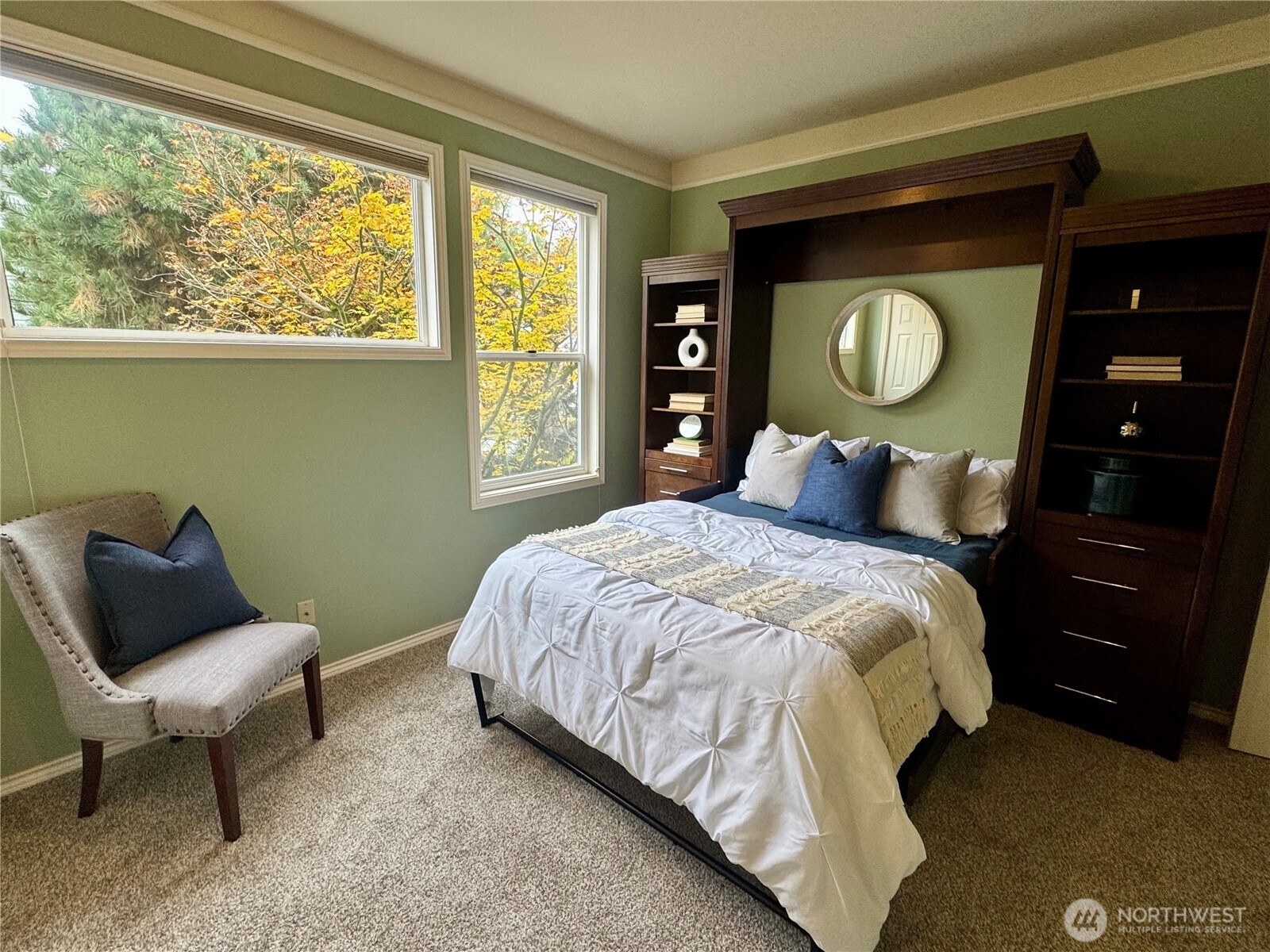 2349 Harbor Avenue Southwest, Unit 303 Seattle, WA 98126 - Photo 24 of 36 a bedroom with a bed and window