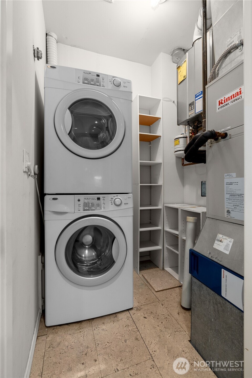 2349 Harbor Avenue Southwest, Unit 303 Seattle, WA 98126 - Photo 27 of 36 a utility room with a washer and dryer