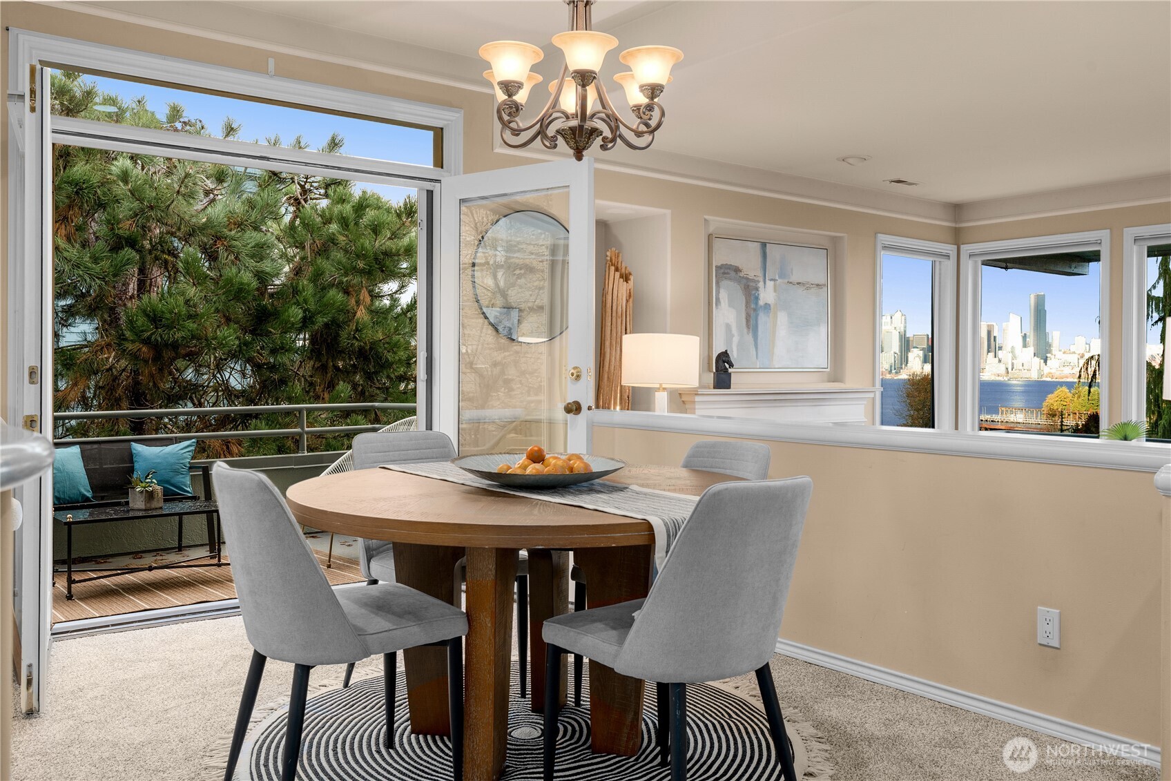 2349 Harbor Avenue Southwest, Unit 303 Seattle, WA 98126 - Photo 10 of 36 a view of a dining room with furniture a chandelier and a window