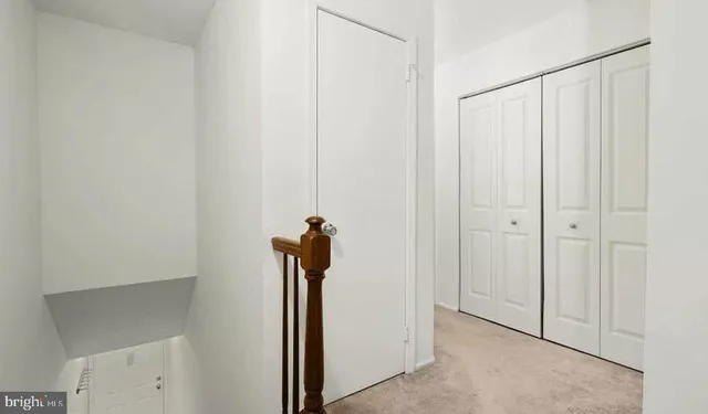 a view of a room with a rack on the wall