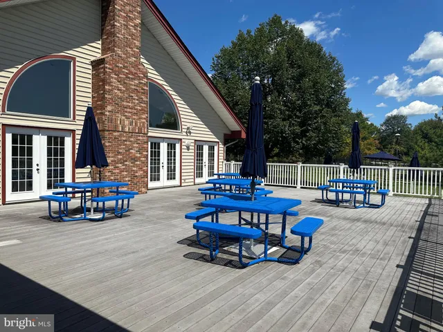a view of a chairs in the roof deck