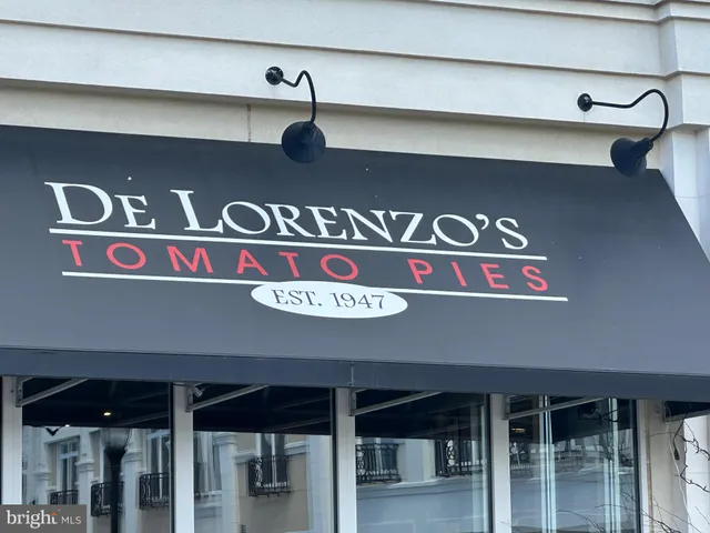 a view of a building with a street