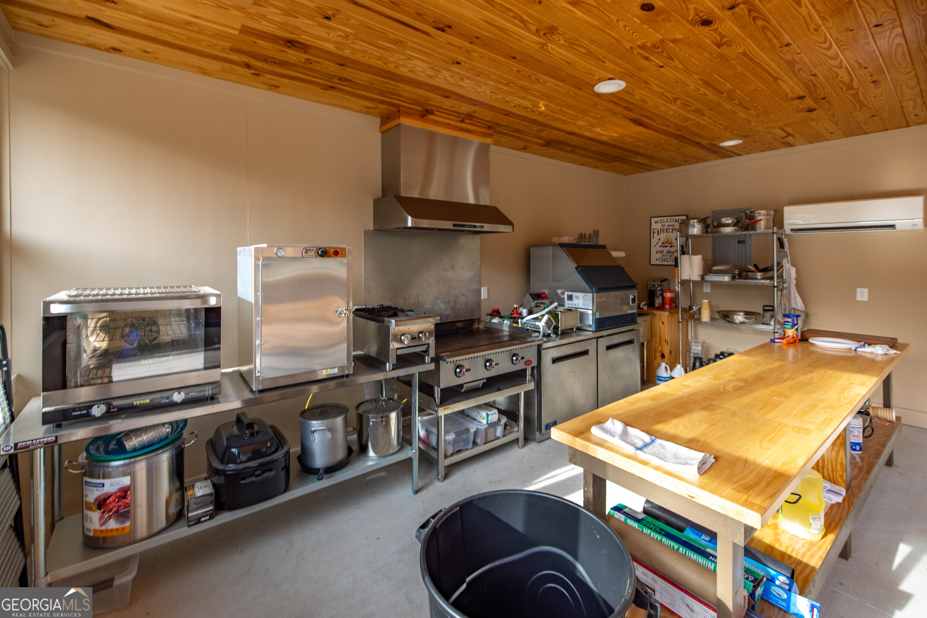 279 Mid River Road White Oak, GA 31568 - Photo 26 of 62 a kitchen with refrigerator and stove