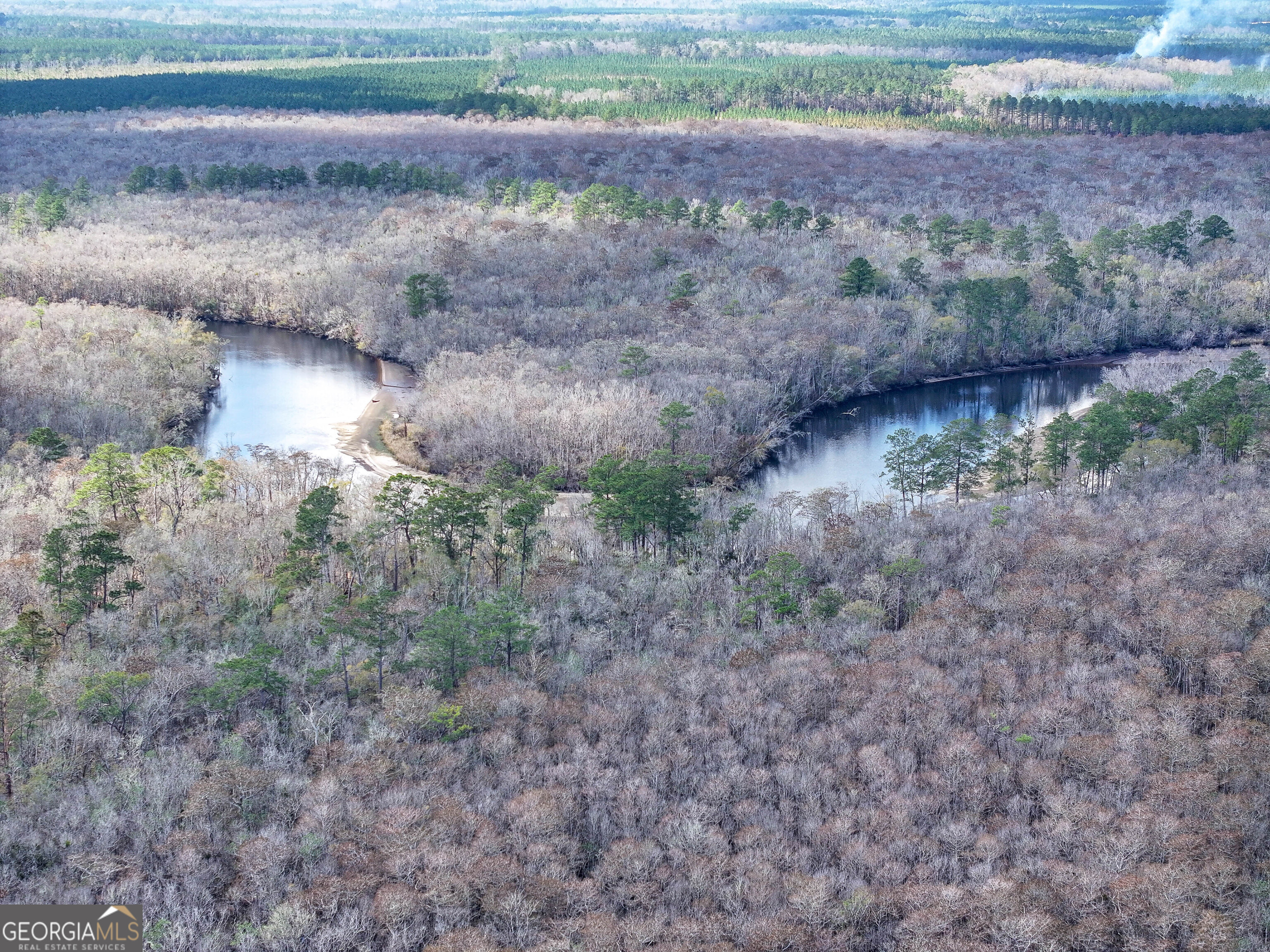 279 Mid River Road White Oak, GA 31568 - Photo 54 of 62 a view of a dry yard with wooden floor