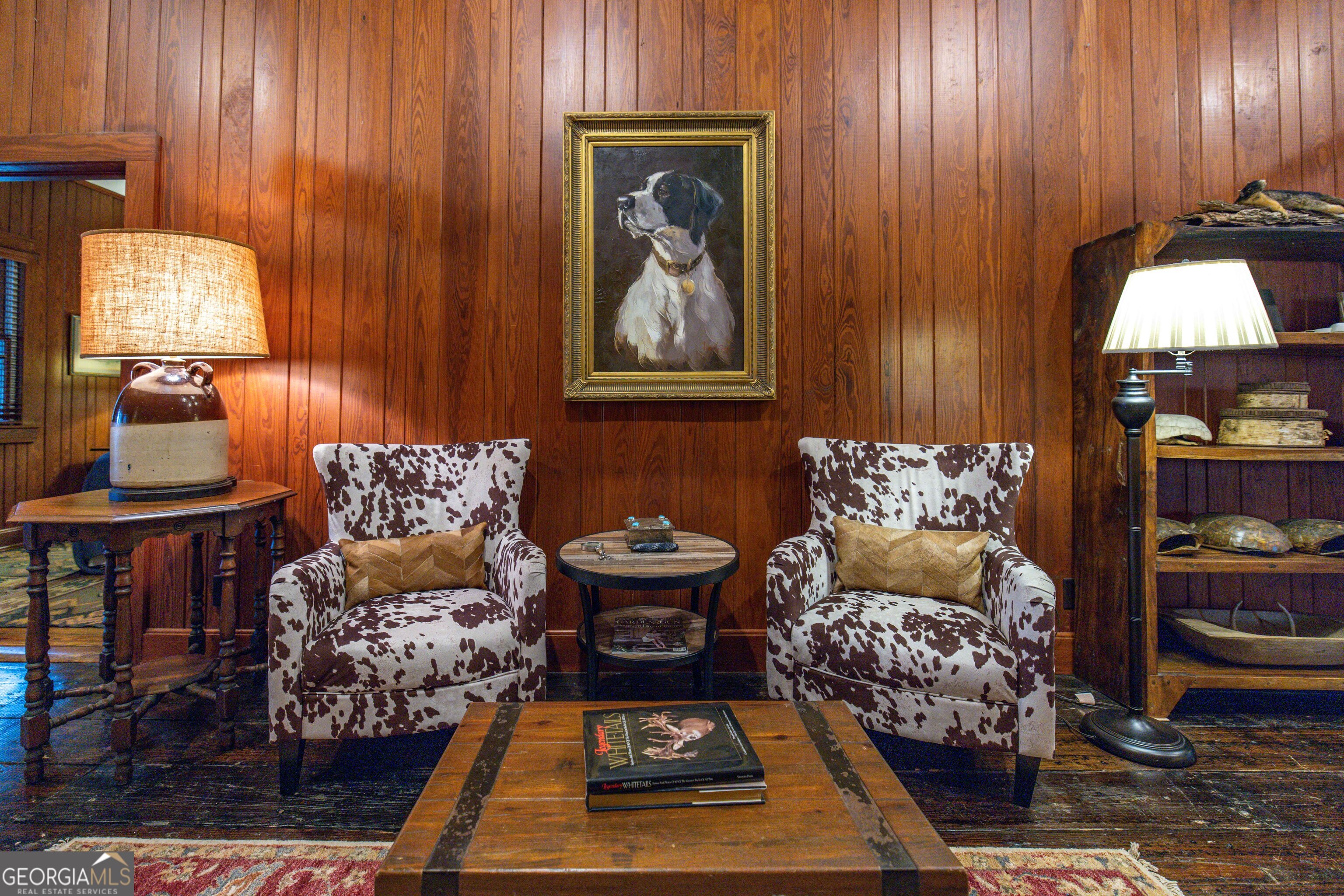 279 Mid River Road White Oak, GA 31568 - Photo 6 of 62 a living room with furniture and painting on the wall