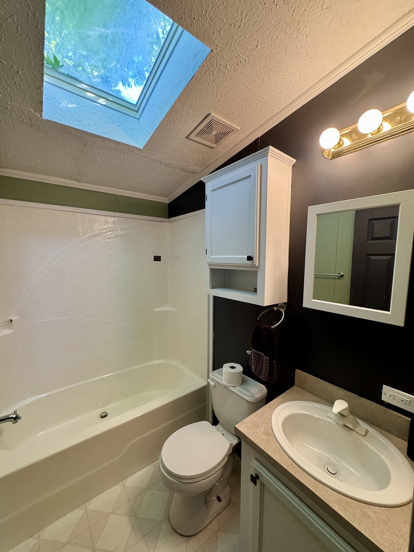 236 Brandy Avenue Princeton, IL 61356 - Photo 18 of 22 a bathroom with a sink a toilet and shower