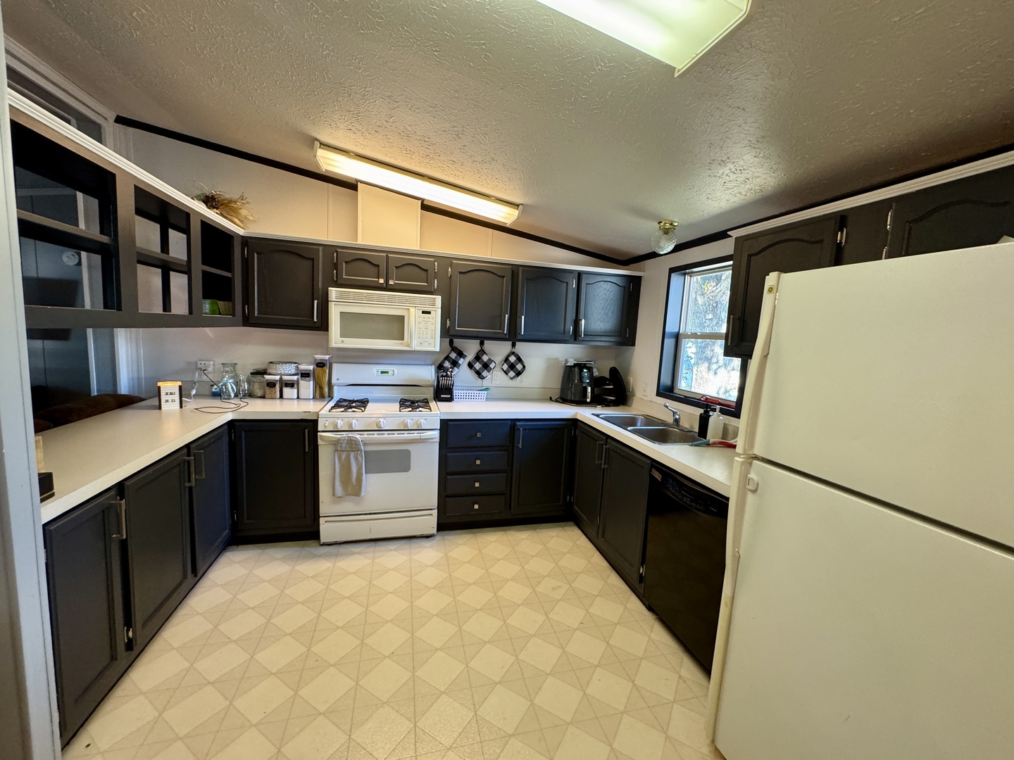 236 Brandy Avenue Princeton, IL 61356 - Photo 6 of 22 a kitchen with stainless steel appliances a refrigerator and a sink