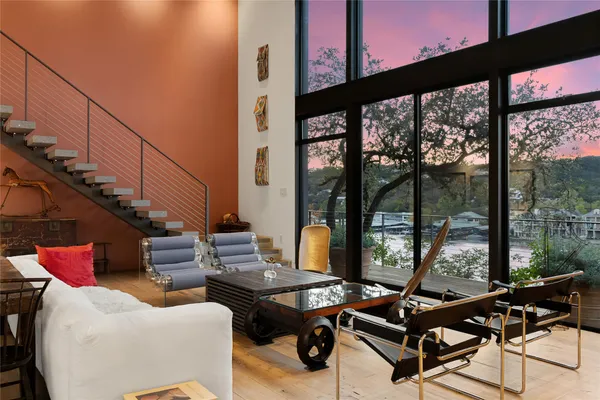 a view of a dining room with furniture window and outside view